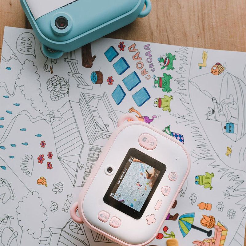 Kids instant print camera in pink with coloring markers and creative drawing sheet