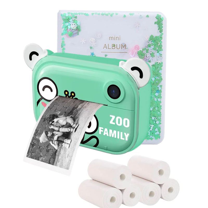 Kids instant print camera in green with playful design, printing black and white photos, includes thermal paper rolls and mini album.
